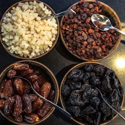 Bowls of assorted dried fruits at the breakfast buffet at Hôtel Villa Berlioz Lyon